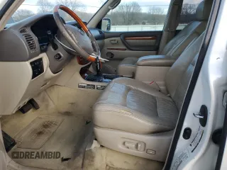 2004 Lexus LX 470 z VIN JTJHT00WX43539807, wystawiony jako Copart lot #87842755 z przebiegiem 335 478 mil mil oraz Czysty tytuł • Clean title. Historia ofert i sprzedaży dostępna na DreamBid. Obrazek 7.