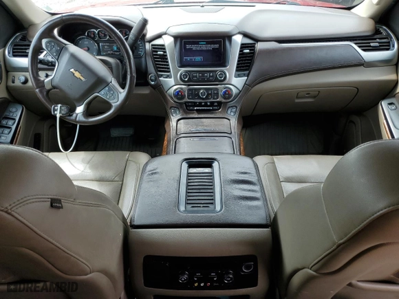 2015 Chevrolet Tahoe LTZ with VIN 1GNSKCKCXFR723104, listed as a Copart auction lot 50660325 with 198,740 mi miles and Salvage Title. Bid and sale history available at carsss.com. Image 8.