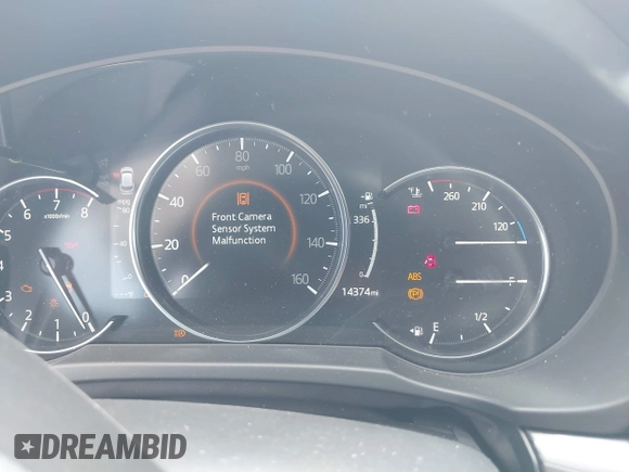 2021 Mazda CX-5 Grand Touring with VIN JM3KFADM6M1373111, listed as a IAAI auction lot 42784431 with 14,374 mi miles and . Bid and sale history available at DreamBid. Image 7.