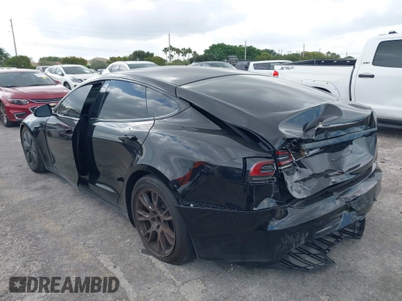 2023 Tesla Model S with VIN 5YJSA1E53PF510757, listed as a IAAI auction lot 42075624 with Not provided miles and . Bid and sale history available at DreamBid. Image 3.