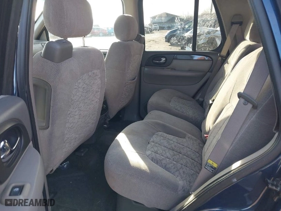 2004 GMC Envoy SLE with VIN 1GKDS13S842152119, listed as a IAAI auction lot 41187115 with 194,304 mi miles. Bid and sale history available at carsss.com. Image 8.