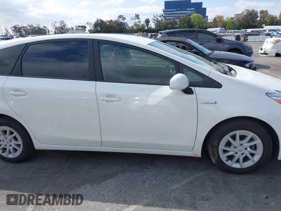 2012 Toyota Prius Two z VIN JTDZN3EU6C3137453, wystawiony jako IAAI lot #41889133 z przebiegiem 169 504 mil mil oraz . Historia ofert i sprzedaży dostępna na DreamBid. Obrazek 13.