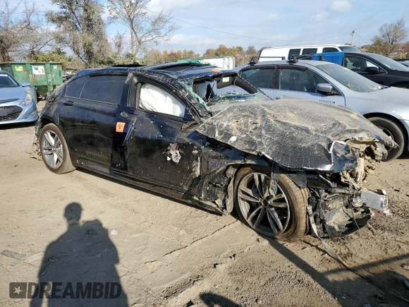 2018 BMW 7 Series 740i xDrive with VIN WBA7E4C57JGV28123, listed as a Copart auction lot 79229034 with 0 mi miles and Salvage Title. Bid and sale history available at carsss.com. Image 4.