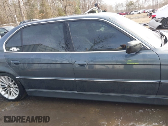 2001 BMW 7 Series 740iL with VIN WBAGH83491DP28749, listed as a IAAI auction lot 41440556 with 198,734 mi miles. Bid and sale history available at carsss.com. Image 13.