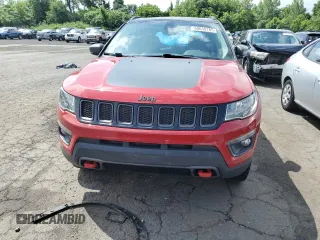 2017 Jeep Compass Trailhawk with VIN 3C4NJDDB7HT657463, listed as a Copart auction lot 60650765 with 100,979 mi miles and Salvage title. Bid and sale history available at DreamBid. Image 5.