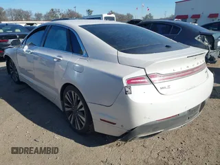 2017 Lincoln MKZ Reserve z VIN 3LN6L5EC6HR632221, wystawiony jako IAAI lot #41369444 z przebiegiem 96 118 mil mil oraz . Historia ofert i sprzedaży dostępna na DreamBid. Obrazek 3.