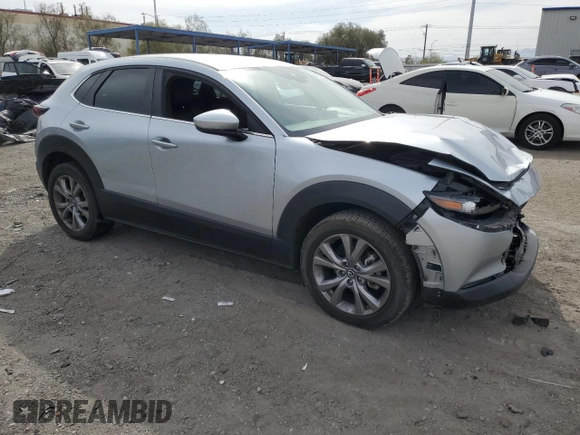 2021 Mazda CX-30 Select with VIN 3MVDMABLXMM256327, listed as a Copart auction lot 51185235 with 76,630 mi miles and Salvage Title. Bid and sale history available at DreamBid. Image 4.