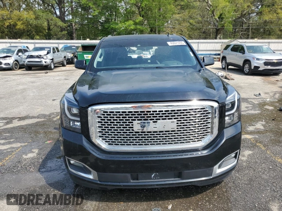 2015 GMC Yukon SLT with VIN 1GKS1BKC0FR113013, listed as a Copart auction lot 49821495 with 294,596 mi miles and Salvage Title. Bid and sale history available at carsss.com. Image 5.