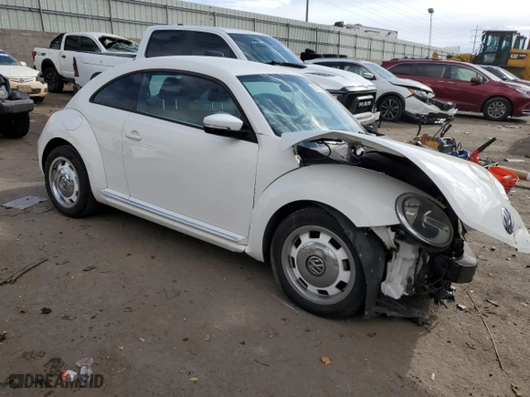2012 Volkswagen Beetle 2.5L PZEV with VIN 3VWJP7AT1CM630089, listed as a Copart auction lot 82707554 with 79,617 mi miles and Salvage Title. Bid and sale history available at carsss.com. Image 4.