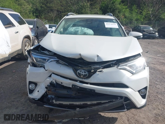 2017 Toyota RAV4 Limited with VIN 2T3YFREV8HW322208, listed as a IAAI auction lot 41974231 with 74,027 mi miles. Bid and sale history available at carsss.com. Image 12.