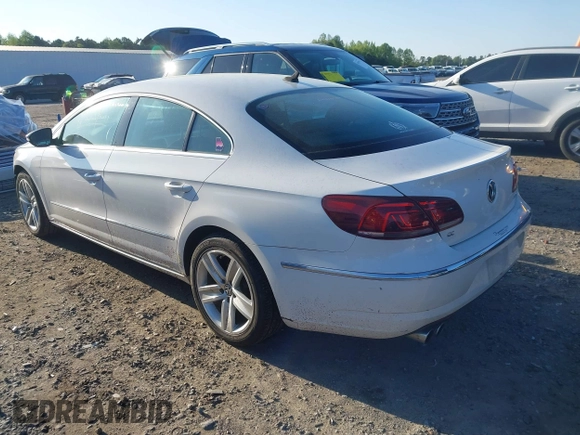 2014 Volkswagen CC R-Line with VIN WVWBP7AN0EE504680, listed as a IAAI auction lot 41990269 with 137,660 mi miles. Bid and sale history available at carsss.com. Image 3.