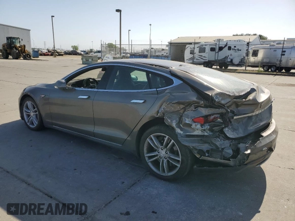 2016 Tesla Model S 90D with VIN 5YJSA1E2XGF133933, listed as a Copart auction lot 60736445 with 203,063 mi miles and Salvage title. Bid and sale history available at DreamBid. Image 2.