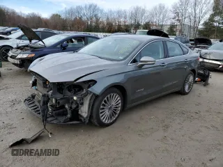 2014 Ford Fusion Titanium Hybrid z VIN 3FA6P0RU2ER324320, wystawiony jako Copart lot #83941304 z przebiegiem 141 761 mil mil oraz Czysty tytuł • Clean title. Historia ofert i sprzedaży dostępna na DreamBid. Obrazek 1.