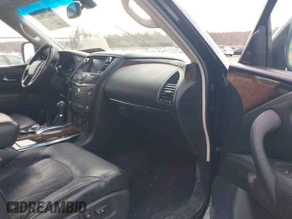 2013 Infiniti QX56 with VIN JN8AZ2NC8D9330158, listed as a IAAI auction lot 41612916 with 124,346 mi miles and . Bid and sale history available at DreamBid. Image 5.