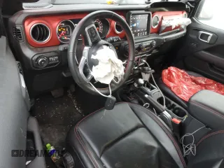 2021 Jeep Wrangler Unlimited Rubicon with VIN 1C4JJXFM7MW818199, listed as a Copart auction lot 87428474 with 18,696 mi miles and Salvage Title. Bid and sale history available at carsss.com. Image 8.