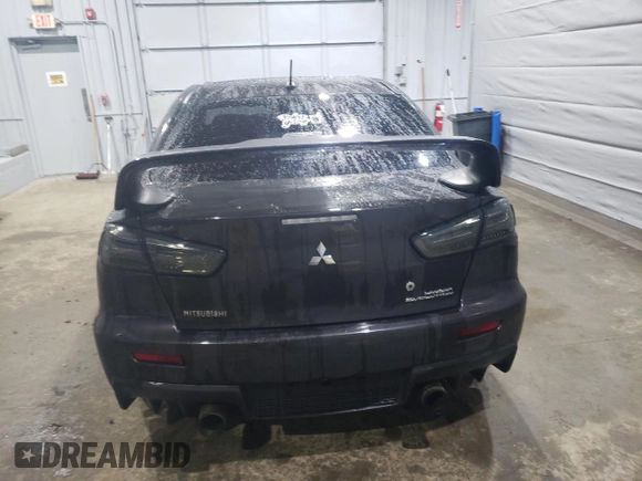 2014 Mitsubishi Lancer Evolution GSR with VIN JA32W8FV5EU017979, listed as a Copart auction lot 47222615 with 109,632 mi miles and Salvage Title. Bid and sale history available at carsss.com. Image 6.