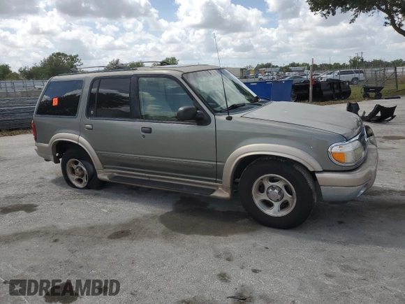 2000 Ford Explorer Eddie Bauer with VIN 1FMZU64E8YZB16294, listed as a Copart auction lot 52494655 with 196,168 mi miles and Salvage title. Bid and sale history available at DreamBid. Image 4.