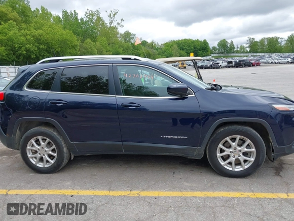 2016 Jeep Cherokee Latitude z VIN 1C4PJMCB2GW145287, wystawiony jako IAAI lot #42302969 z przebiegiem 124 974 mil mil oraz . Historia ofert i sprzedaży dostępna na DreamBid. Obrazek 13.