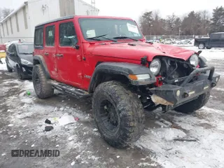 2018 Jeep Wrangler Unlimited Sport S z VIN 1C4HJXDG5JW131522, wystawiony jako IAAI lot #41563099 z przebiegiem 75 405 mil mil oraz . Historia ofert i sprzedaży dostępna na DreamBid. Obrazek 1.