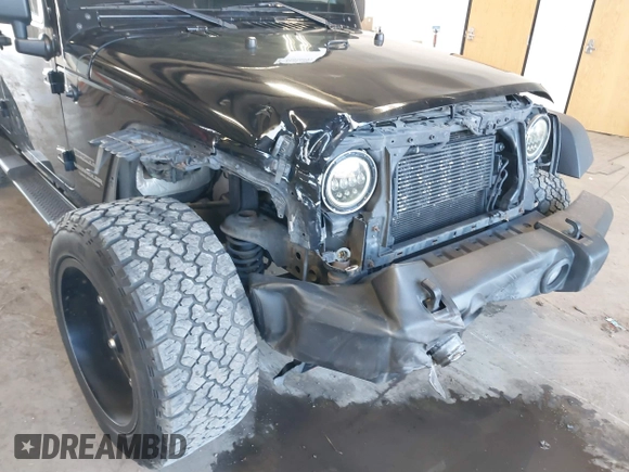 2012 Jeep Wrangler Unlimited Sport with VIN 1C4BJWDG8CL246829, listed as a IAAI auction lot 41816197 with 198,502 mi miles. Bid and sale history available at carsss.com. Image 6.