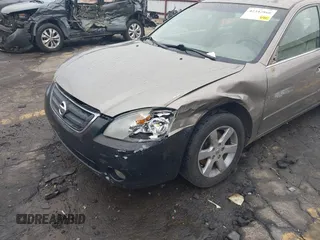 2002 Nissan Altima SL z VIN 1N4AL11D92C294136, wystawiony jako IAAI lot #42342860 z przebiegiem 220 080 mil mil oraz . Historia ofert i sprzedaży dostępna na DreamBid. Obrazek 6.