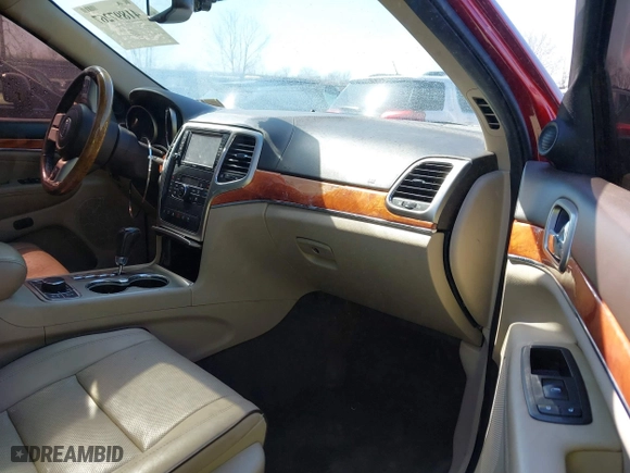 2011 Jeep Grand Cherokee Overland with VIN 1J4RR6GT7BC551649, listed as a IAAI auction lot 41897267 with 82,034 mi miles. Bid and sale history available at carsss.com. Image 5.