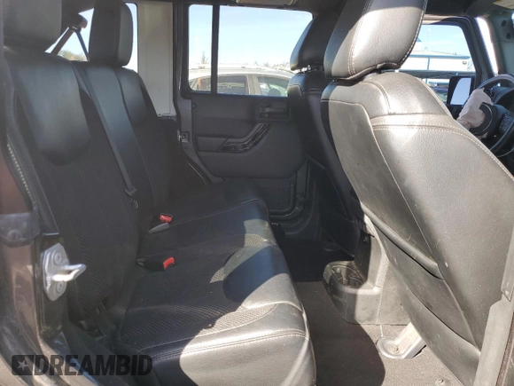 2017 Jeep Wrangler Unlimited Sahara with VIN 1C4BJWEG7HL618442, listed as a Copart auction lot 44628985 with 66,582 mi miles and Salvage Title. Bid and sale history available at carsss.com. Image 11.