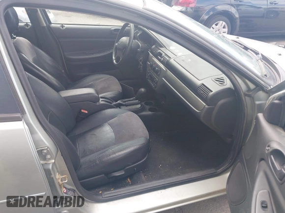 2004 Chrysler Sebring Touring with VIN 1C3AL56R74N412427, listed as a IAAI auction lot 42199777 with 103,265 mi miles and . Bid and sale history available at DreamBid. Image 5.