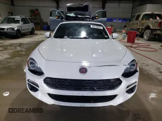 2017 FIAT 124 Spider Lusso z VIN JC1NFAEK5H0106151, wystawiony jako Copart lot #88738865 z przebiegiem 81 333 mil mil oraz Szkoda całkowita • Salvage title. Historia ofert i sprzedaży dostępna na DreamBid. Obrazek 5.
