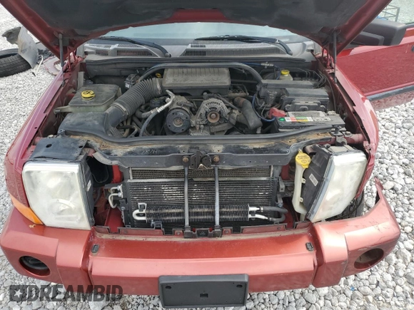 2006 Jeep Commander z VIN 1J8HG48K76C131681, wystawiony jako Copart lot #64386985 z przebiegiem 142 135 mil mil oraz Szkoda całkowita • Salvage title. Historia ofert i sprzedaży dostępna na DreamBid. Obrazek 12.