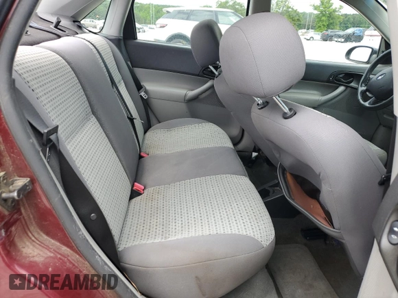 2006 Ford Focus S z VIN 1FAFP34N36W171785, wystawiony jako Copart lot #55815195 z przebiegiem 164 074 mil mil oraz Szkoda całkowita • Salvage title. Historia ofert i sprzedaży dostępna na DreamBid. Obrazek 10.