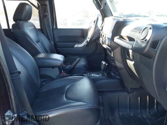 2015 Jeep Wrangler Unlimited Rubicon with VIN 1C4BJWFGXFL610153, listed as a IAAI auction lot 41575401 with 114,583 mi miles. Bid and sale history available at carsss.com. Image 5.
