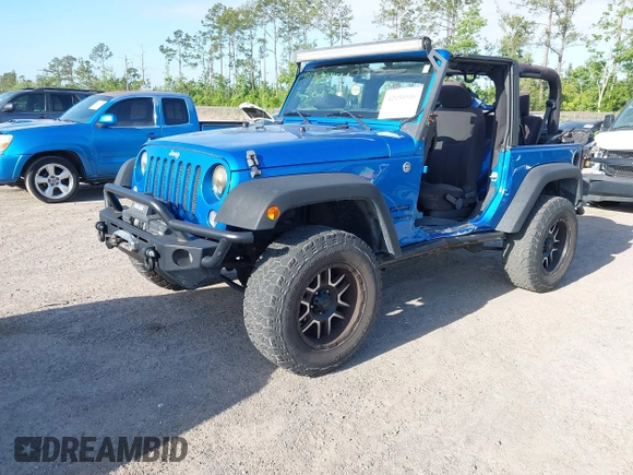 2015 Jeep Wrangler Sport z VIN 1C4AJWAG8FL550859, wystawiony jako IAAI lot #42154946 z przebiegiem 143 658 mil mil oraz . Historia ofert i sprzedaży dostępna na DreamBid. Obrazek 18.