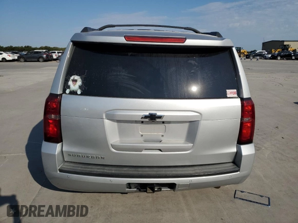 2018 Chevrolet Suburban LS with VIN 1GNSCGKC3JR136952, listed as a Copart auction lot 75264824 with 132,487 mi miles and Clean title. Bid and sale history available at DreamBid. Image 6.