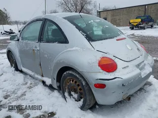 2004 Volkswagen New Beetle Coupe GL with VIN 3VWBK31C44M422057, listed as a IAAI auction lot 41978706 with 159,854 mi miles. Bid and sale history available at carsss.com. Image 3.