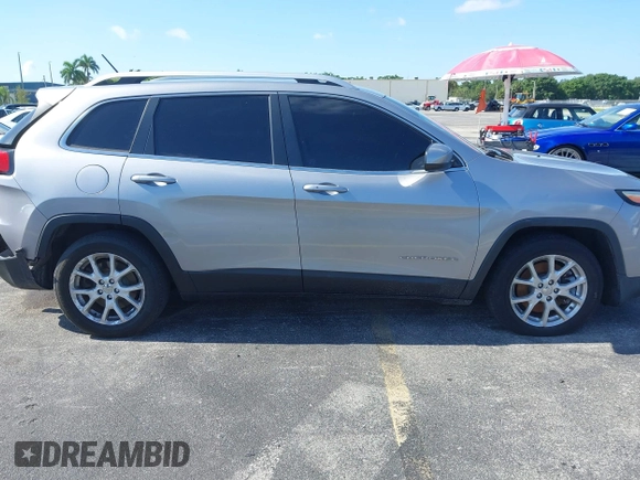 2014 Jeep Cherokee Latitude with VIN 1C4PJLCS6EW103423, listed as a IAAI auction lot 40118289 with 112,120 mi miles and . Bid and sale history available at DreamBid. Image 21.