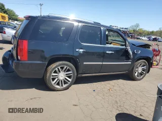 2014 Cadillac Escalade Platinum z VIN 1GYS4DEF9ER217707, wystawiony jako Copart lot #54745095 z przebiegiem 123 177 mil mil oraz Szkoda całkowita • Salvage title. Historia ofert i sprzedaży dostępna na DreamBid. Obrazek 3.