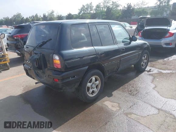 2000 Toyota RAV4 with VIN JT3GP10V9Y7066288, listed as a IAAI auction lot 42485170 with 213,973 mi miles and . Bid and sale history available at DreamBid. Image 4.