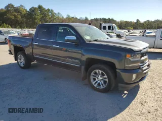 2017 Chevrolet Silverado 1500 LTZ with VIN 3GCUKSEJ4HG382713, listed as a Copart auction lot 76395764 with 134,794 mi miles and Salvage Title. Bid and sale history available at DreamBid. Image 4.