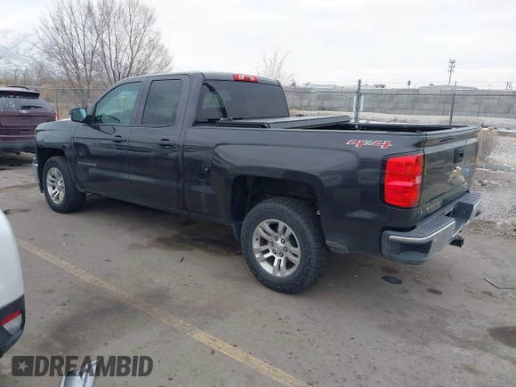 2014 Chevrolet Silverado 1500 LT with VIN 1GCVKREC8EZ325070, listed as a IAAI auction lot 41328199 with 164,009 mi miles and . Bid and sale history available at DreamBid. Image 3.