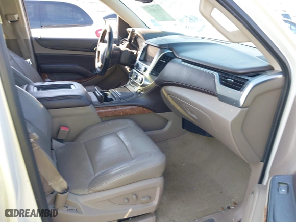 2015 Chevrolet Tahoe LTZ with VIN 1GNSCCKCXFR287609, listed as a IAAI auction lot 41688936 with 112,678 mi miles. Bid and sale history available at carsss.com. Image 5.