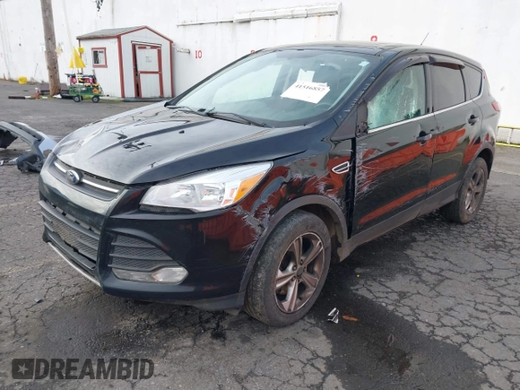 2016 Ford Escape SE with VIN 1FMCU9G97GUA30718, listed as a IAAI auction lot 41516857 with 167,576 mi miles and . Bid and sale history available at DreamBid. Image 2.
