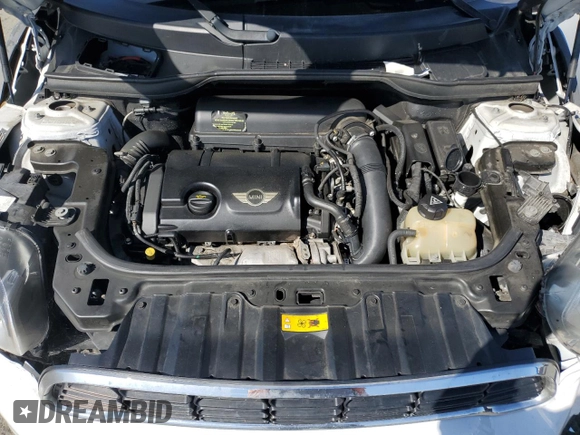 2014 MINI Countryman S with VIN WMWZC3C5XEWP25792, listed as a Copart auction lot 58583455 with 83,831 mi miles and Salvage title. Bid and sale history available at DreamBid. Image 11.