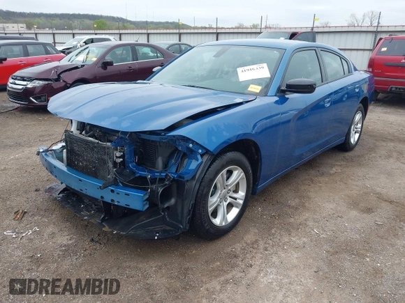 2023 Dodge Charger SXT with VIN 2C3CDXBGXPH674476, listed as a IAAI auction lot 41910339 with 14,079 mi miles. Bid and sale history available at carsss.com. Image 2.