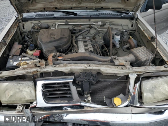 2000 Nissan Frontier XE with VIN 1N6DD26S6YC415423, listed as a Copart auction lot 59086535 with 122,746 mi miles and Salvage title. Bid and sale history available at DreamBid. Image 11.