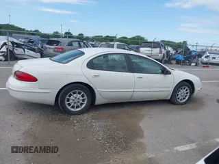1999 Chrysler Concorde LX z VIN 2C3HD46RXXH620742, wystawiony jako IAAI lot #42292747 z przebiegiem Nie podano mil oraz . Historia ofert i sprzedaży dostępna na DreamBid. Obrazek 13.