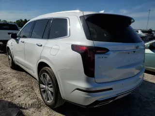 2024 Cadillac XT6 FWD Premium Luxury with VIN 1GYKPCRS1RZ700963, listed as a Copart auction lot 49031094 with 2,977 mi miles and Salvage Title. Bid and sale history available at carsss.com. Image 2.