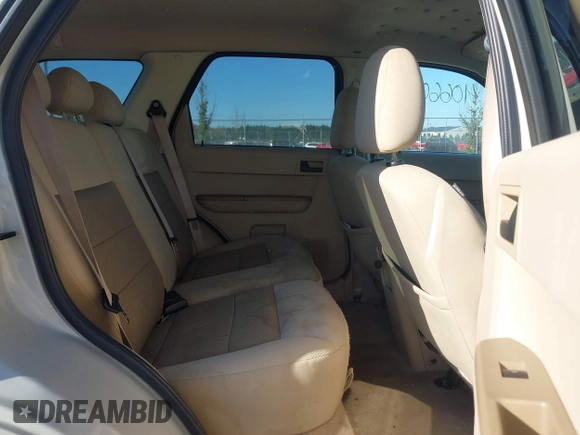 2008 Ford Escape XLT with VIN 1FMCU93158KA39754, listed as a IAAI auction lot 40660179 with 113,956 mi miles. Bid and sale history available at carsss.com. Image 8.