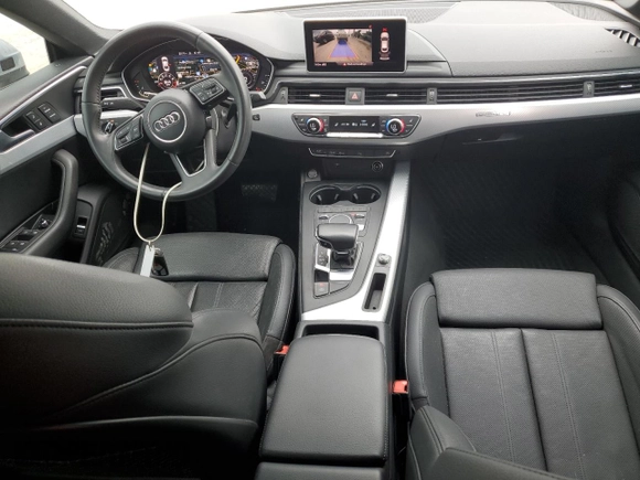 2018 Audi A5 Sportback Premium Plus with VIN WAUENCF55JA055144, listed as a Copart auction lot 50407034 with 119,786 mi miles and . Bid and sale history available at DreamBid. Image 8.