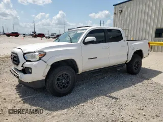 2020 Toyota Tacoma SR5 with VIN 3TMCZ5AN4LM304072, listed as a Copart auction lot 61797025 with 58,246 mi miles and Salvage title. Bid and sale history available at DreamBid. Image 1.
